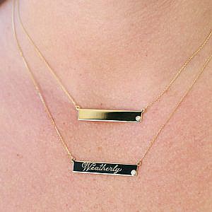 name plate necklaces on model