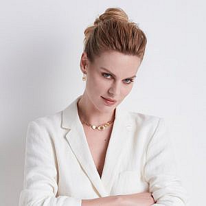 model wearing short marco bicego gold necklace