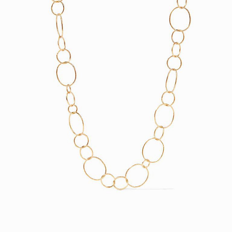 gold link necklace on white background