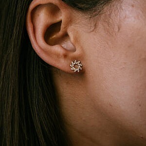 ear wearing diamond earrings