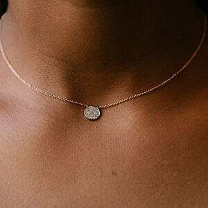 neck wearing gold and diamond circle necklace