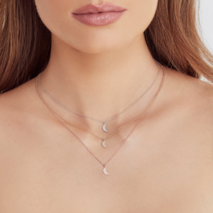 moon necklaces on neck
