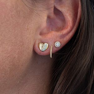 heart stud earrings on model