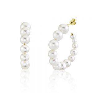 Graduated pearl hoop earrings on white background