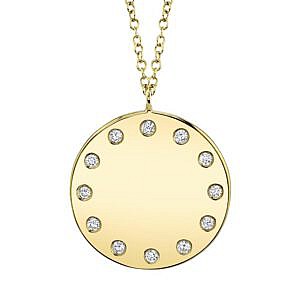 gold circle pendant with diamonds