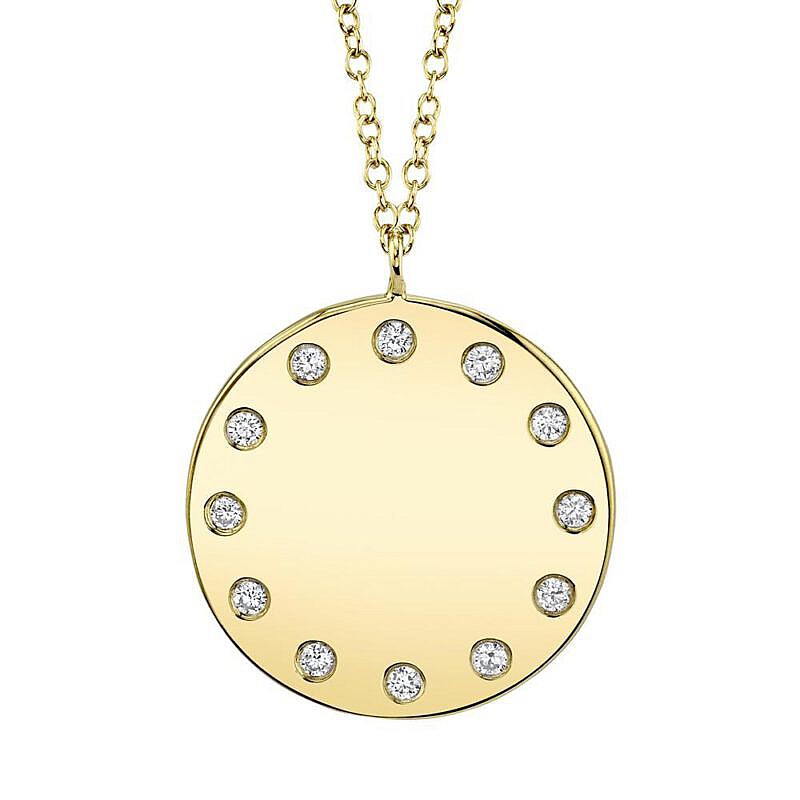 gold circle pendant with diamonds