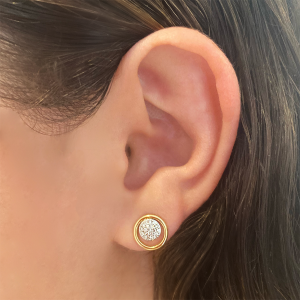 infinity loop stud earrings on model