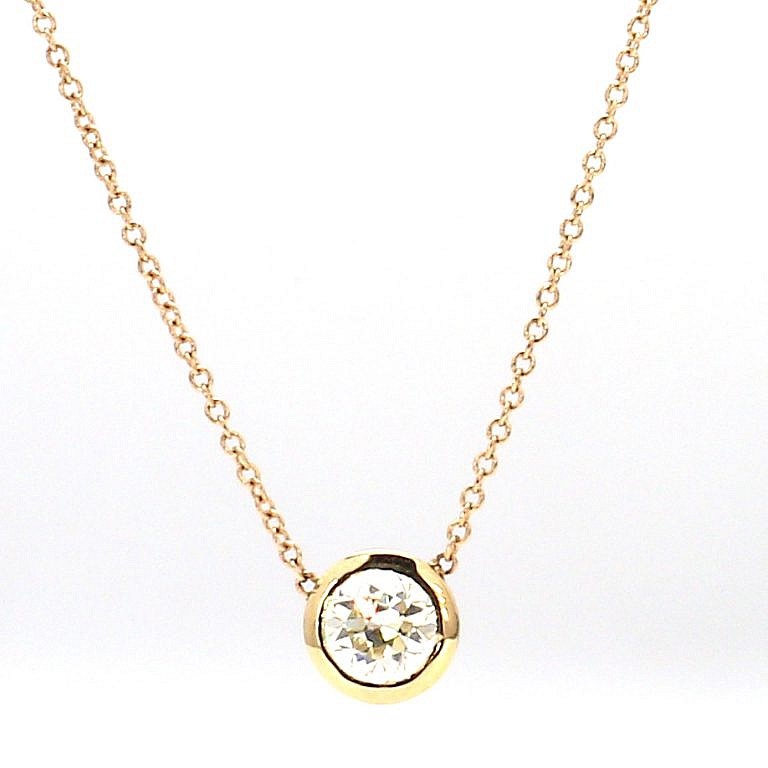 diamond solitaire pendant necklace on white background