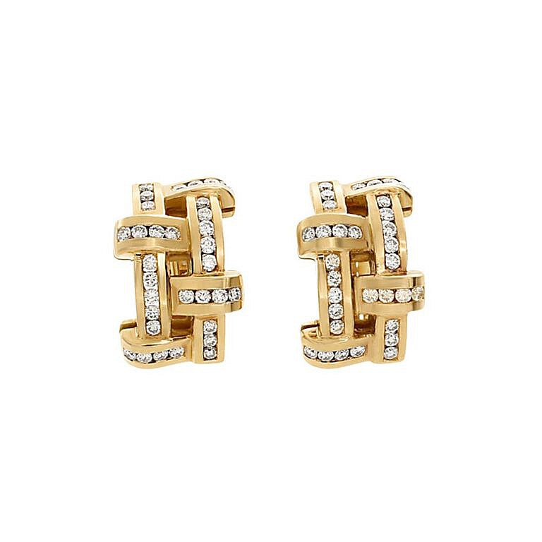 Estate cross stitch gold and diamond stud earrings.