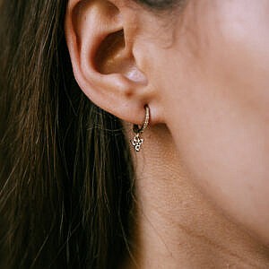 diamond drop hoops on ear