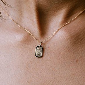 gold and diamond mini dog tag necklace lifestyle